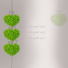清新的绿叶绘制爱心礼物高清图片